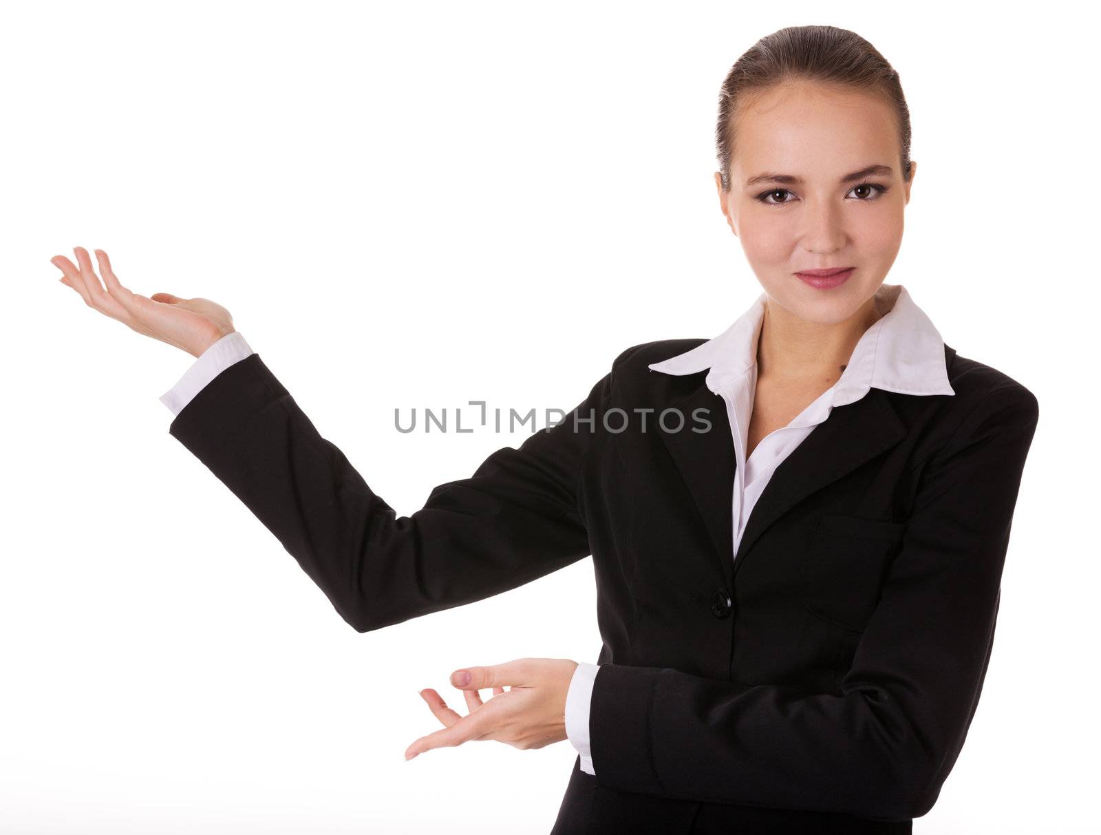 Smiling young businesswoman in black suit with depostration gesture by both hands. Isolated on white background.