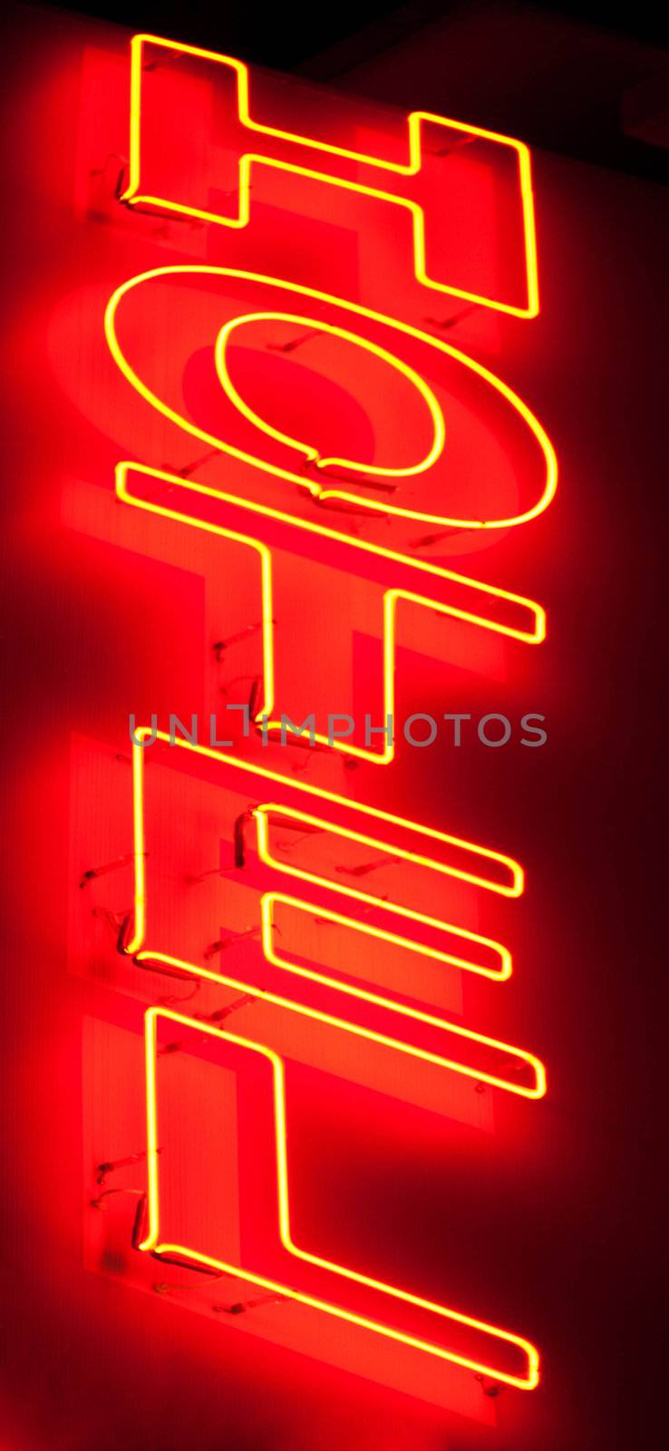 Hotel neon sign on black background