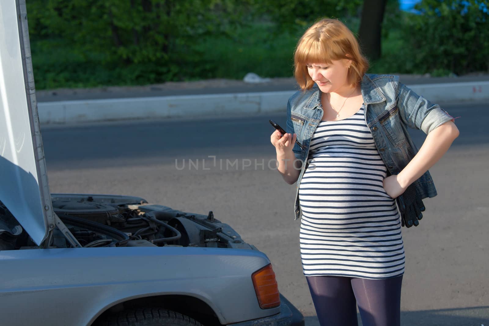 Pregnant Woman Calling for help near the Broken Car by Discovod