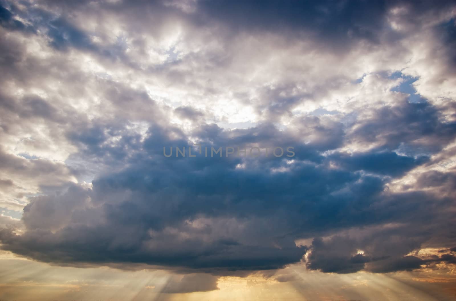 Gloomy clouds have shrouded the sky before a thunder-storm. 