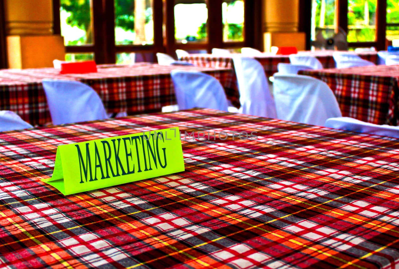Marketing sign on top of the table during a business conference
