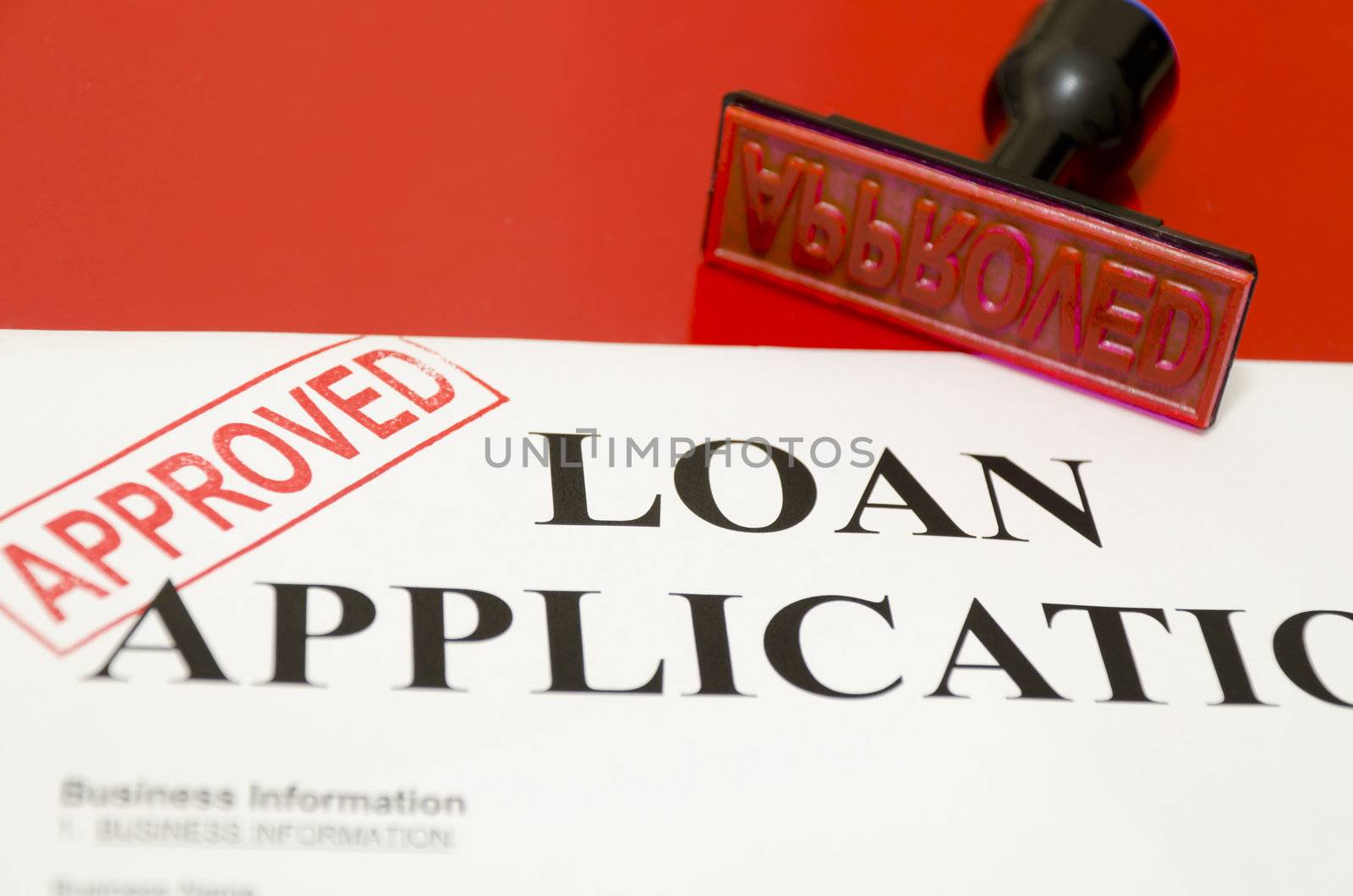 corner of the stamp printed on complete loan applications was approved