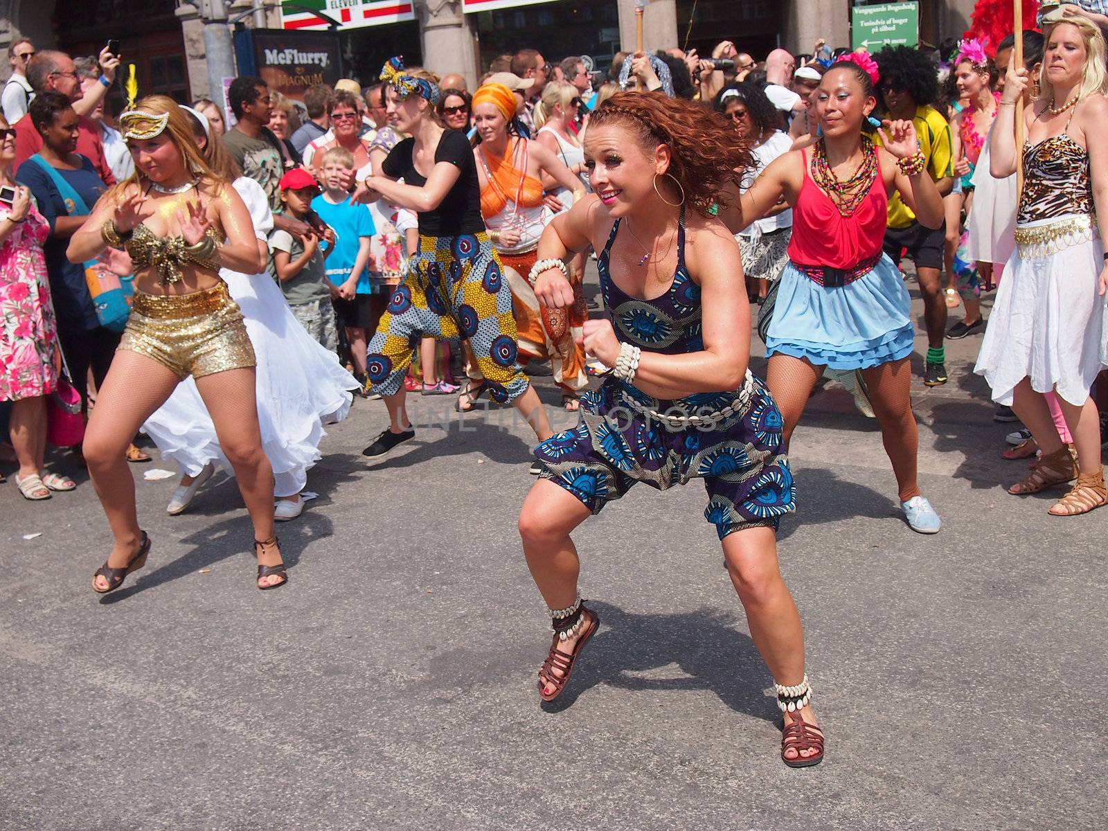 COPENHAGEN - MAY 26: Participants in the 30th annual Copenhagen Carnival parade of fantastic costumes, samba dancing and Latin styles starts on May 25, 2012 in Copenhagen, Denmark.  