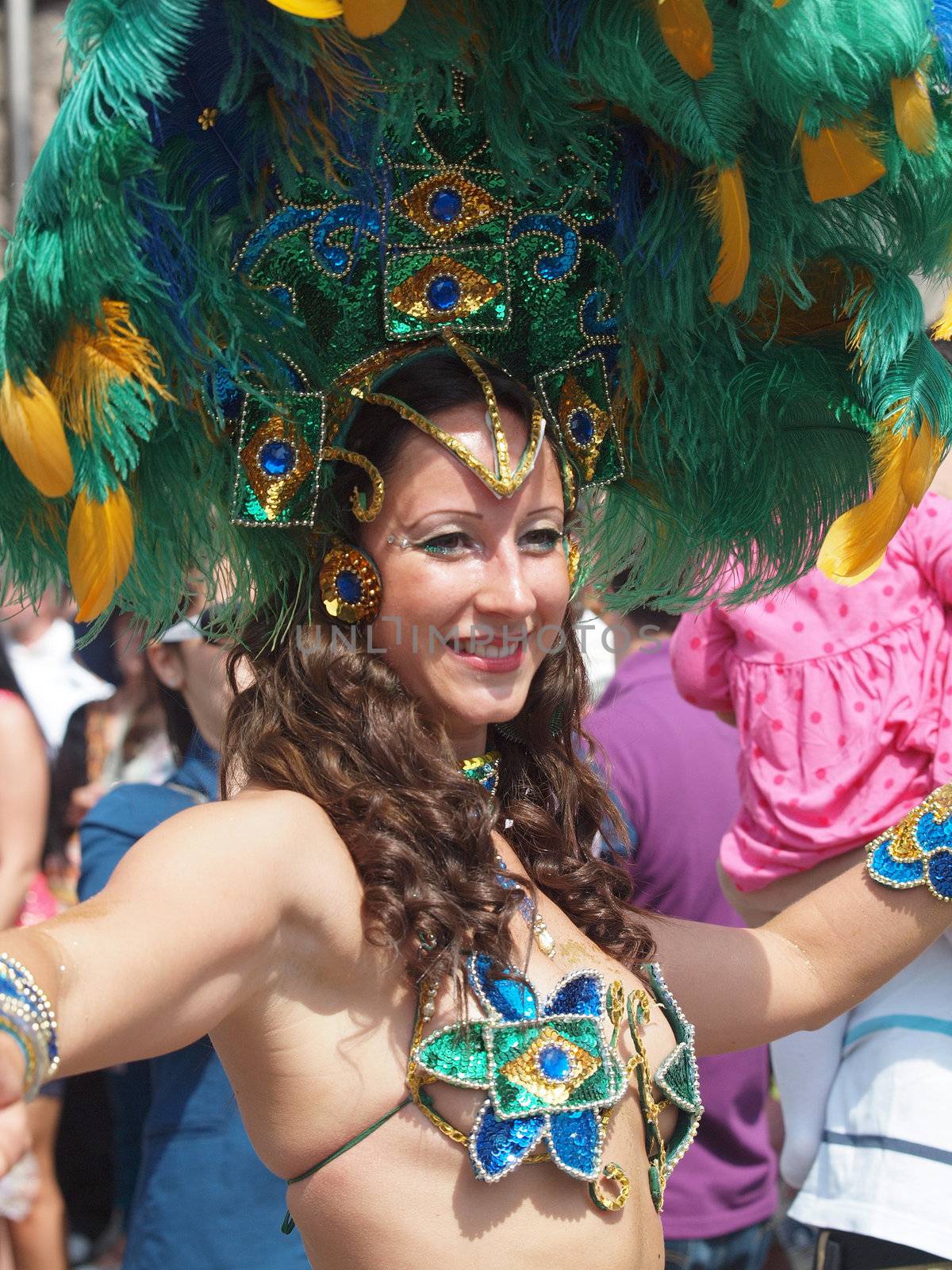 COPENHAGEN - MAY 26: Participant in the 30th annual Copenhagen Carnival parade of fantastic costumes, samba dancing and Latin styles starts on May 25, 2012 in Copenhagen, Denmark.