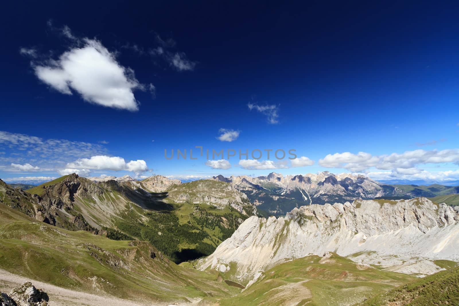 Aerial view of Monzoni Valley with Catinaccio mount on background, Trentino Italy