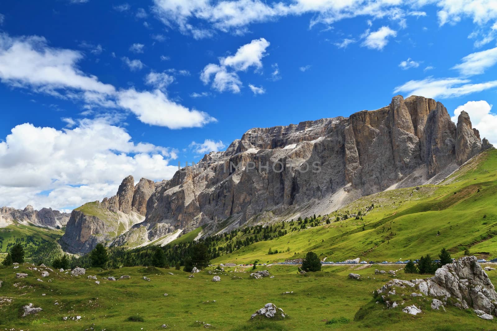 summer landscape of Sella mountain and Gardena valley from Sella pass, Italian Dolomites