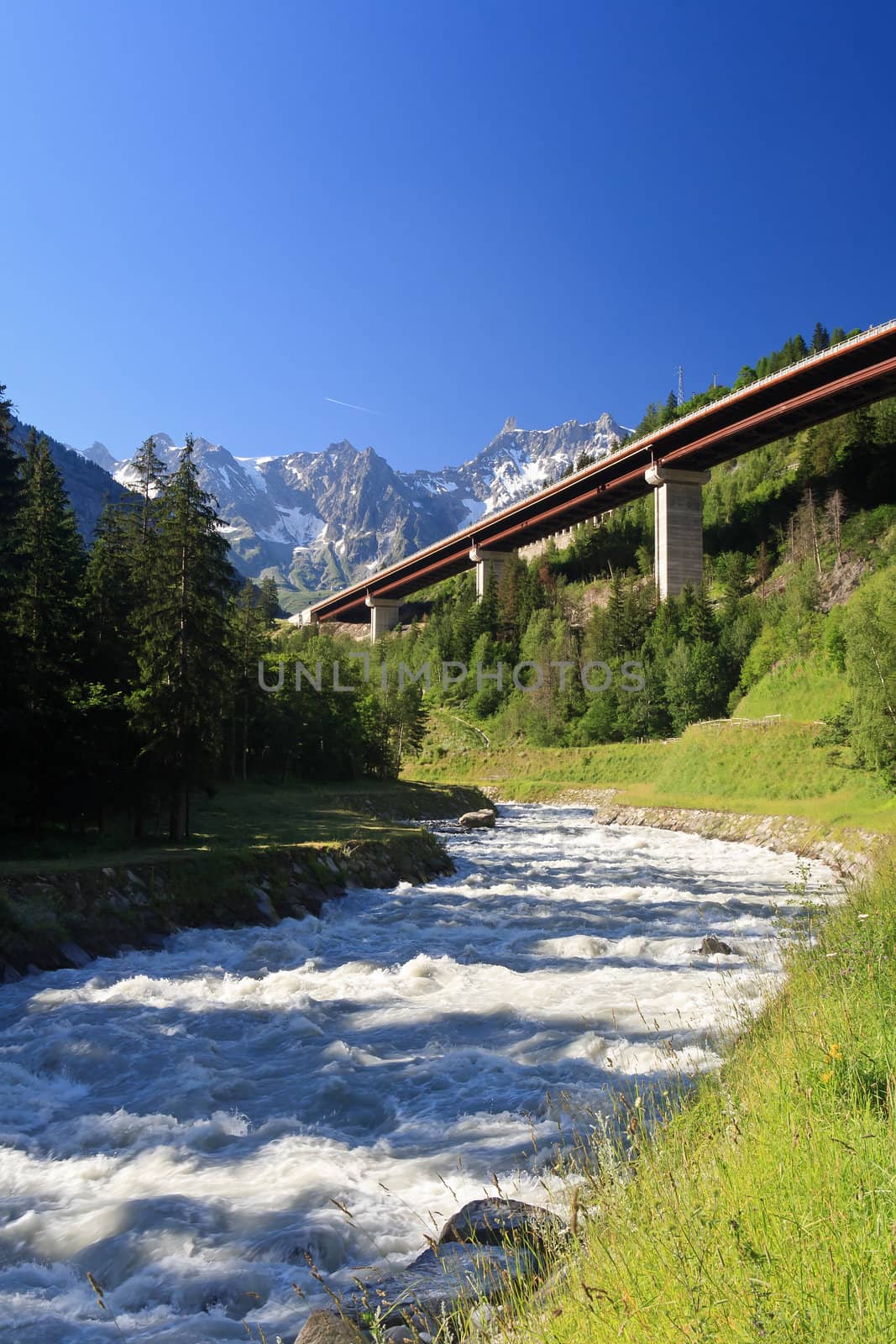 bridge over Dora Baltea river near Courmayeur, Aosta Valley, Italy