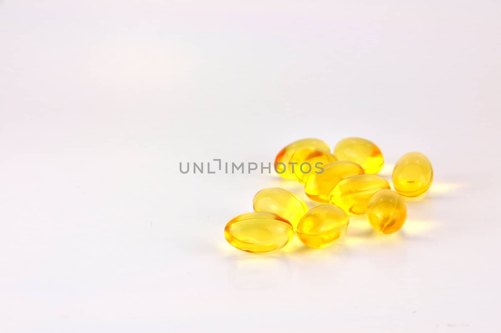 Fish oil pills on white background 