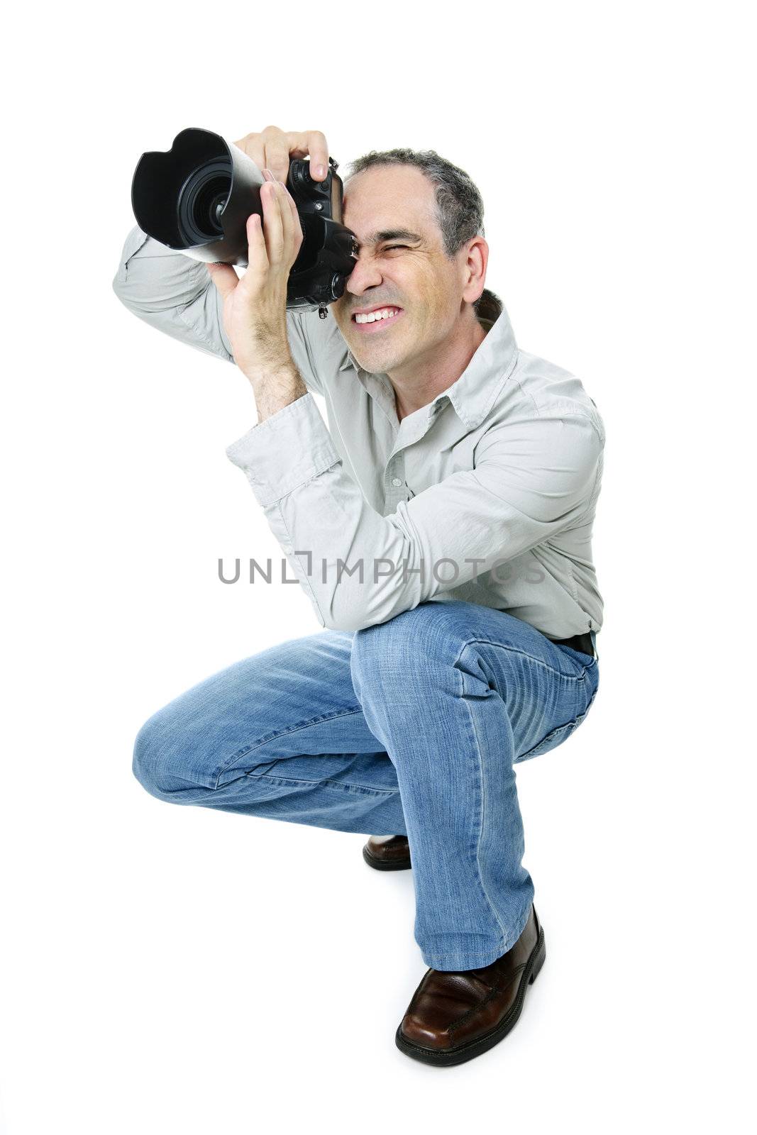 Portrait of male photographer with camera isolated on white background