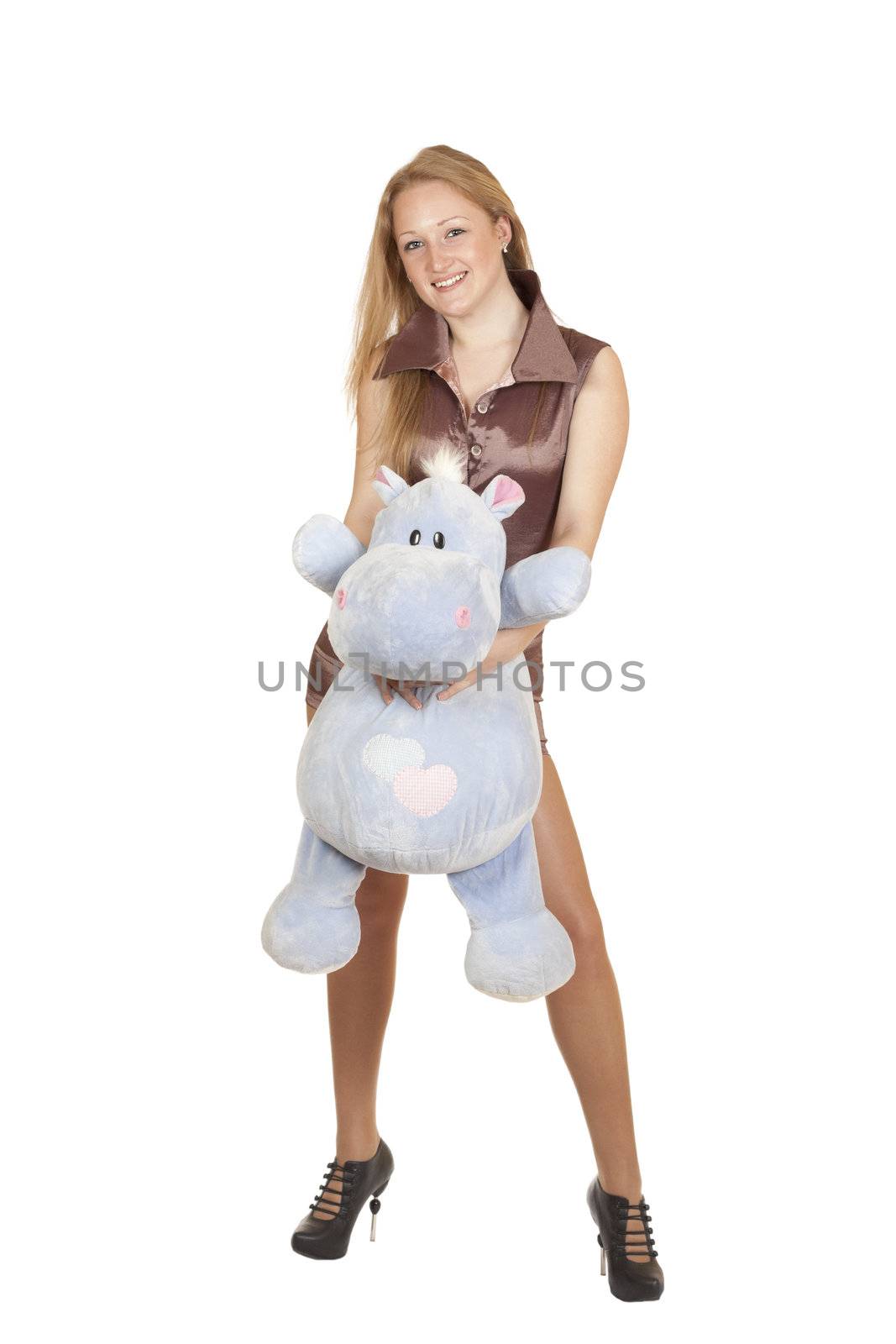 young blond girl holding a toy isolated on a white background
