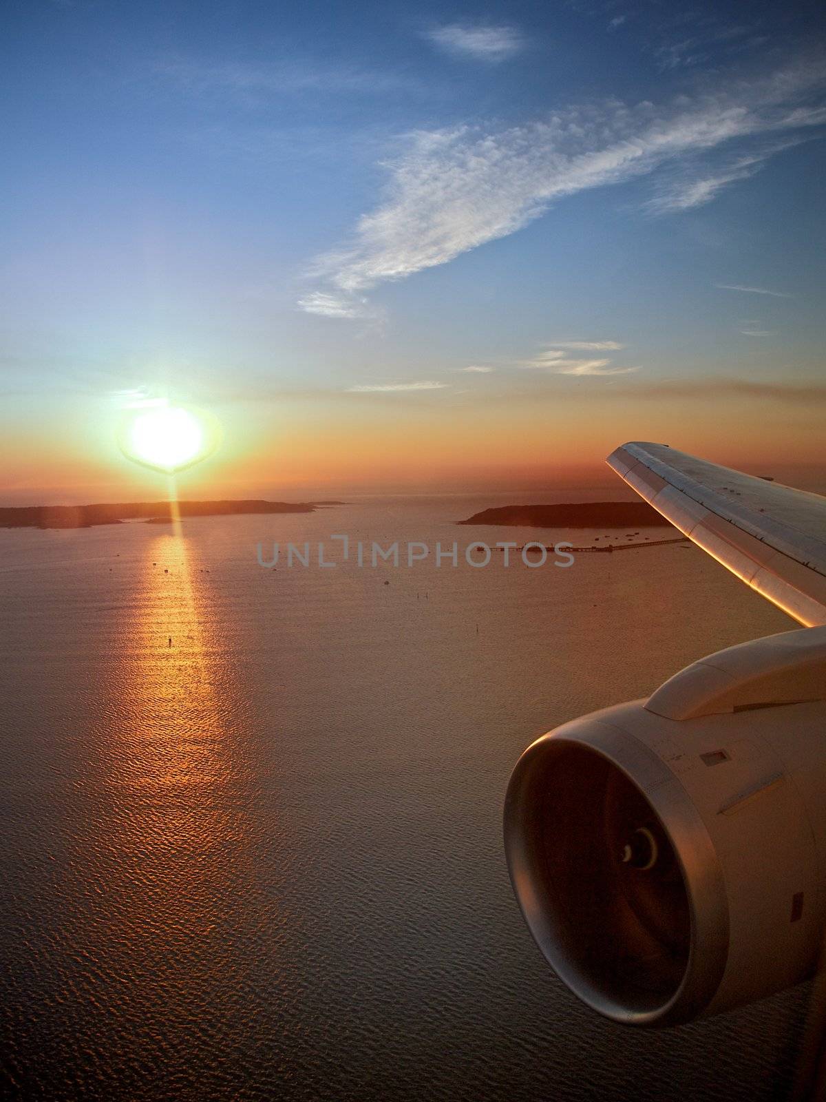 View from airplane window looking over the wing