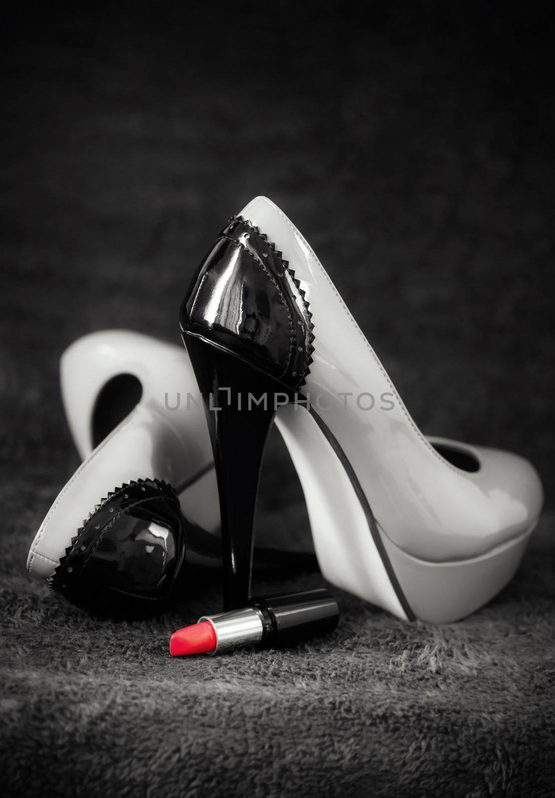 Concept about women sexuality with tall shoes and red lipstick