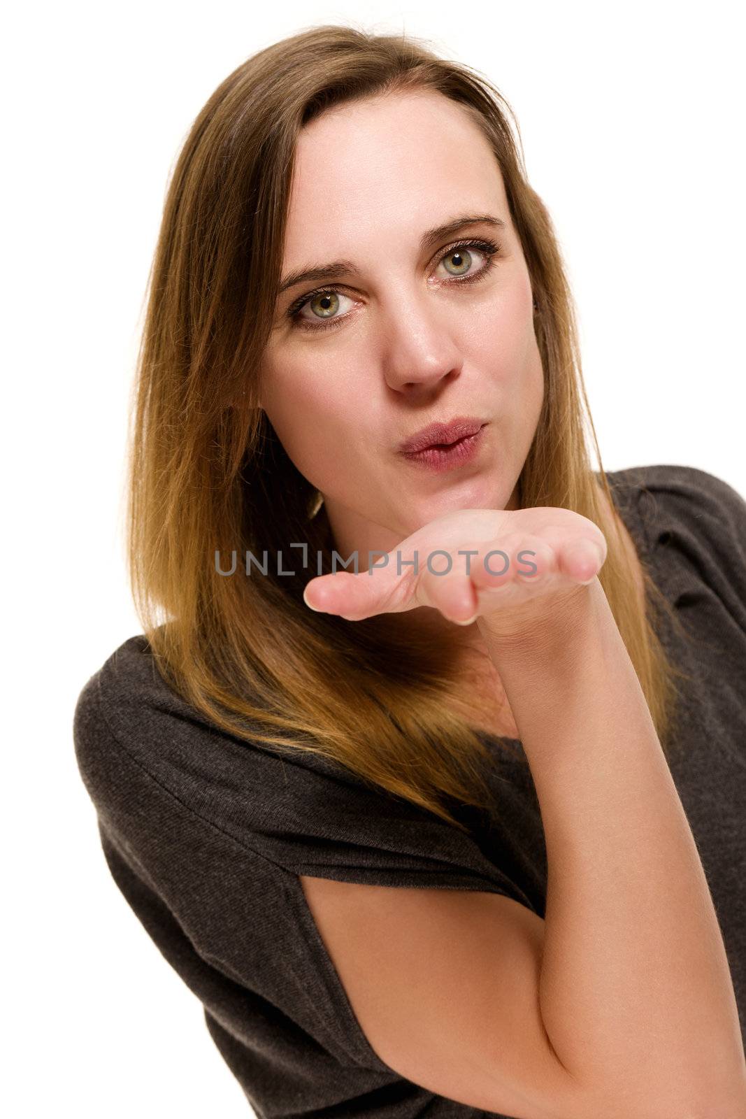woman sending a kiss on white background