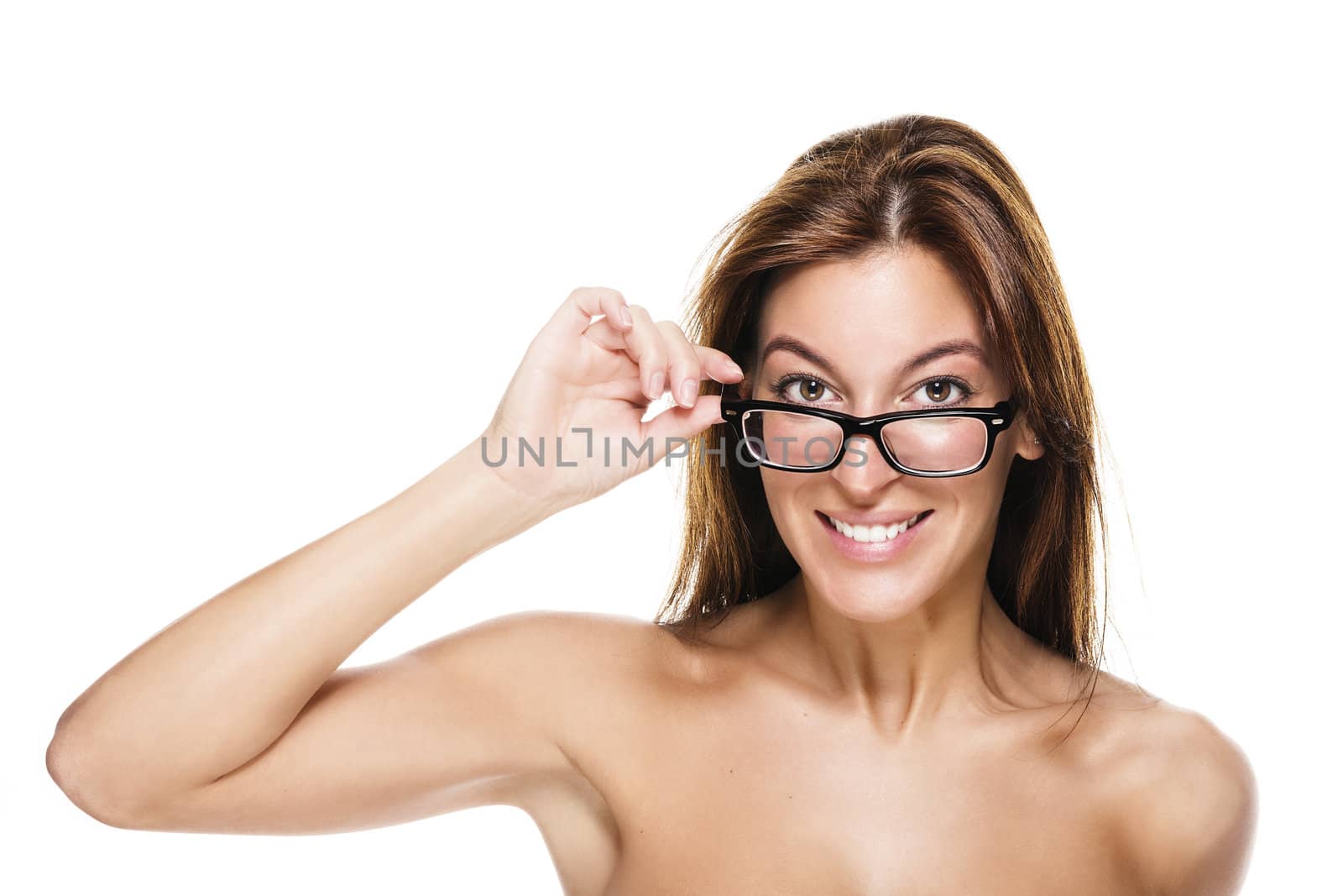 young beautiful woman holding the frame of her glasses on white background