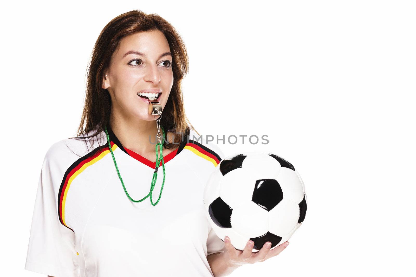 beautiful woman wearing football shirt with a whistle holding football on white background