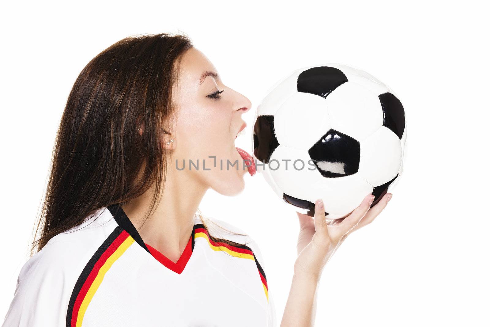 beautiful woman wearing football shirt licking on a football on white background