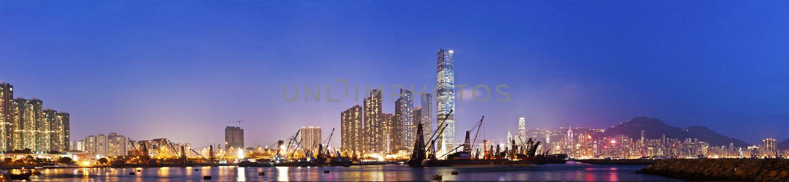 Hong Kong skyline night view at coast by kawing921