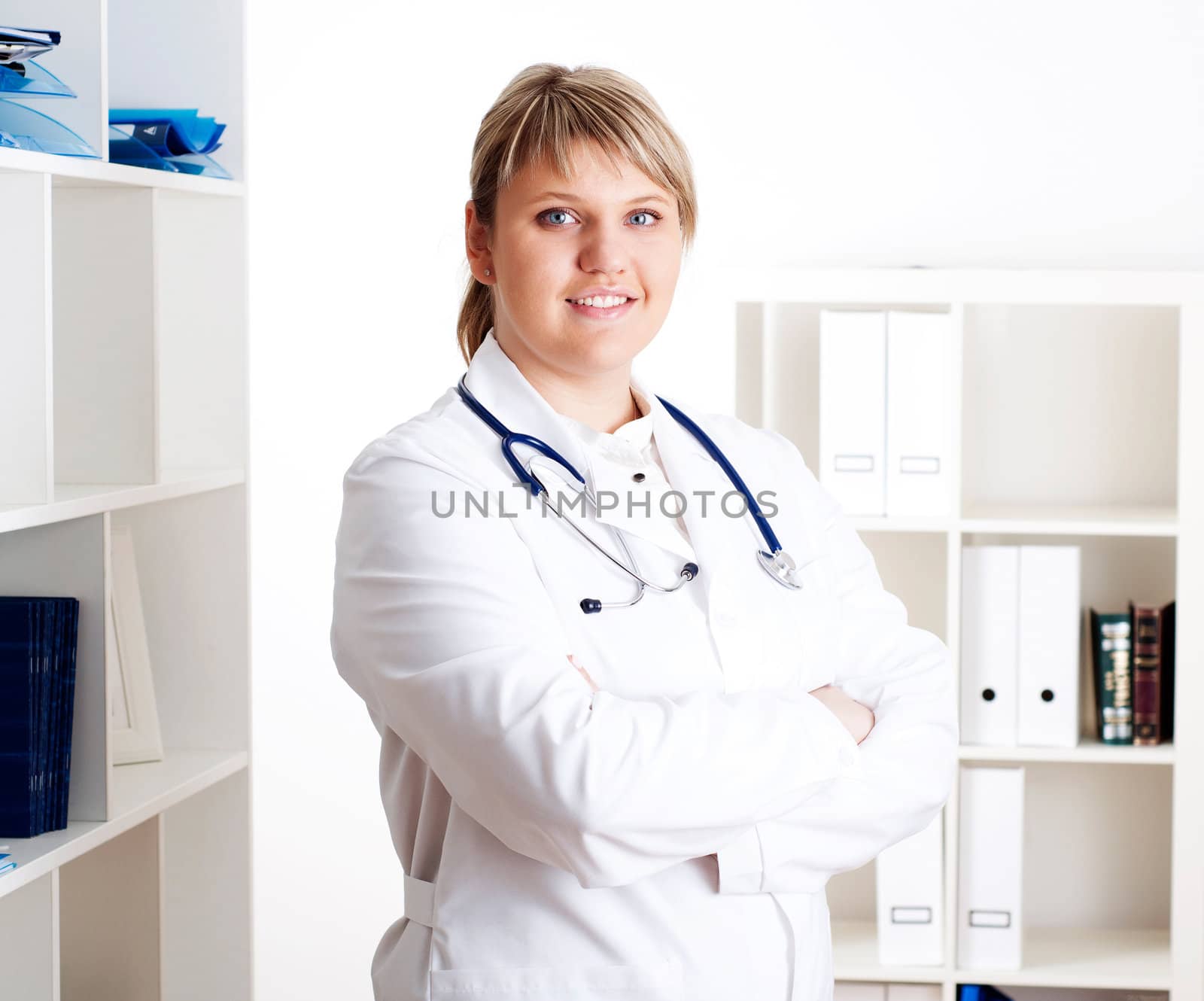 Smiling medical doctor woman with stethoscope. by adam121