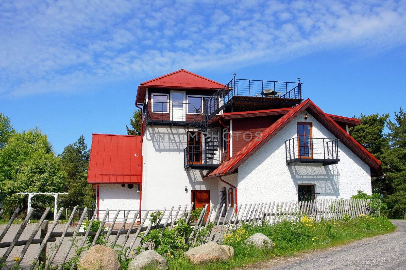 The white brick two-storeyed house