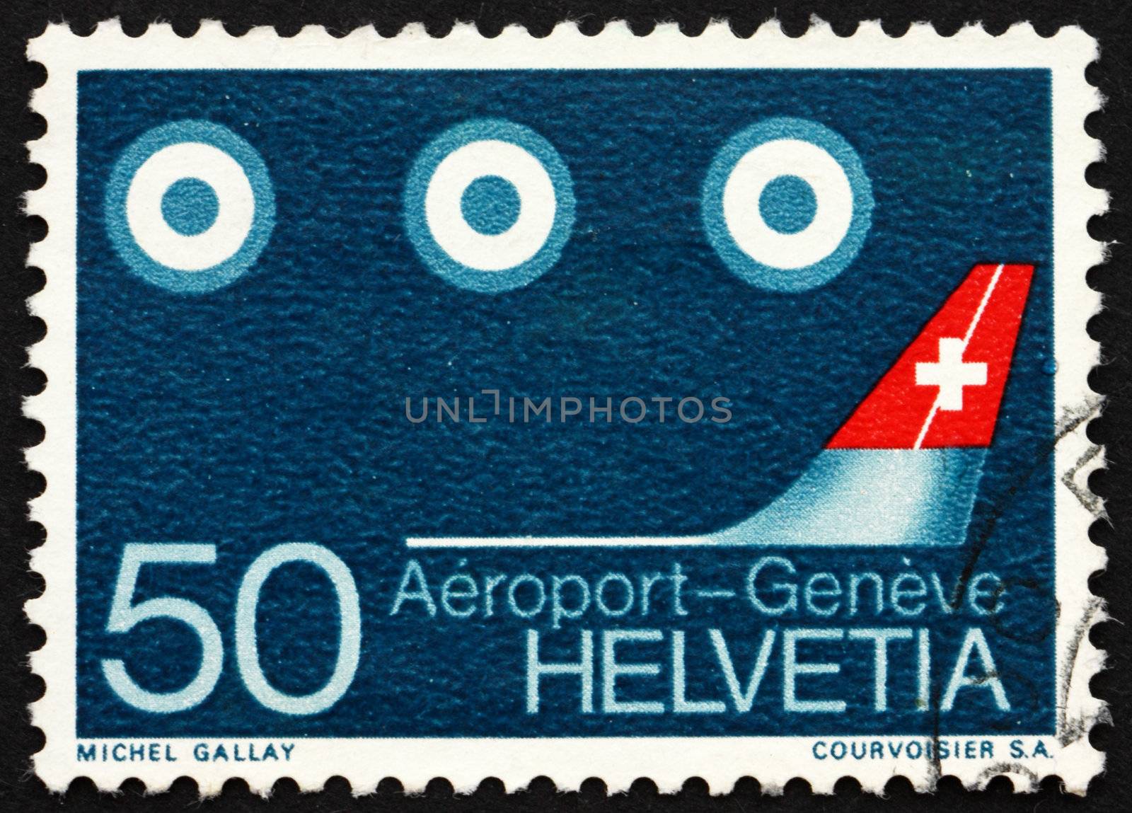 SWITZERLAND - CIRCA 1968: a stamp printed in the Switzerland shows Aircraft Tail and Satellites, new Geneva Air Terminal, circa 1968