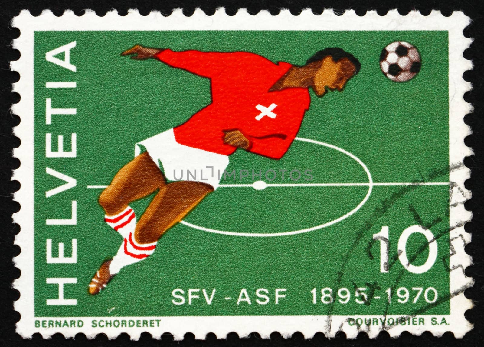 SWITZERLAND - CIRCA 1970: a stamp printed in the Switzerland shows Soccer Player, 75th Anniversary of Swiss Soccer Association, circa 1970