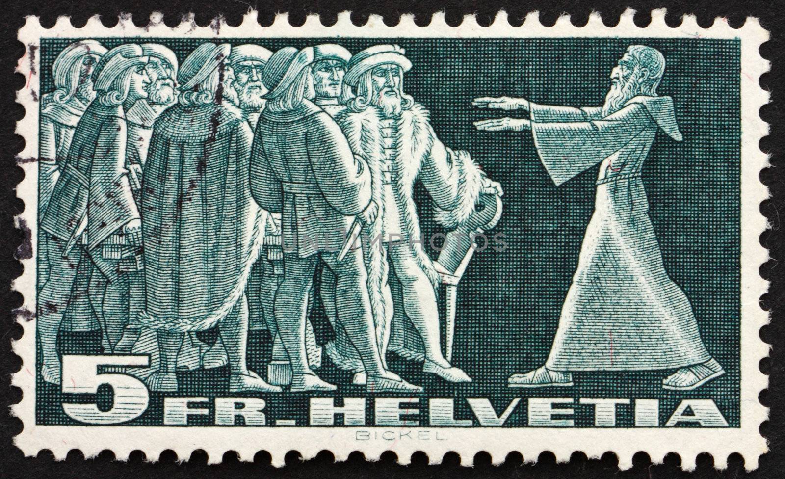 SWITZERLAND - CIRCA 1938: a stamp printed in the Switzerland shows Diet of Stans, 1481, Message from the Hermit Nikklaus von Flue, circa 1938