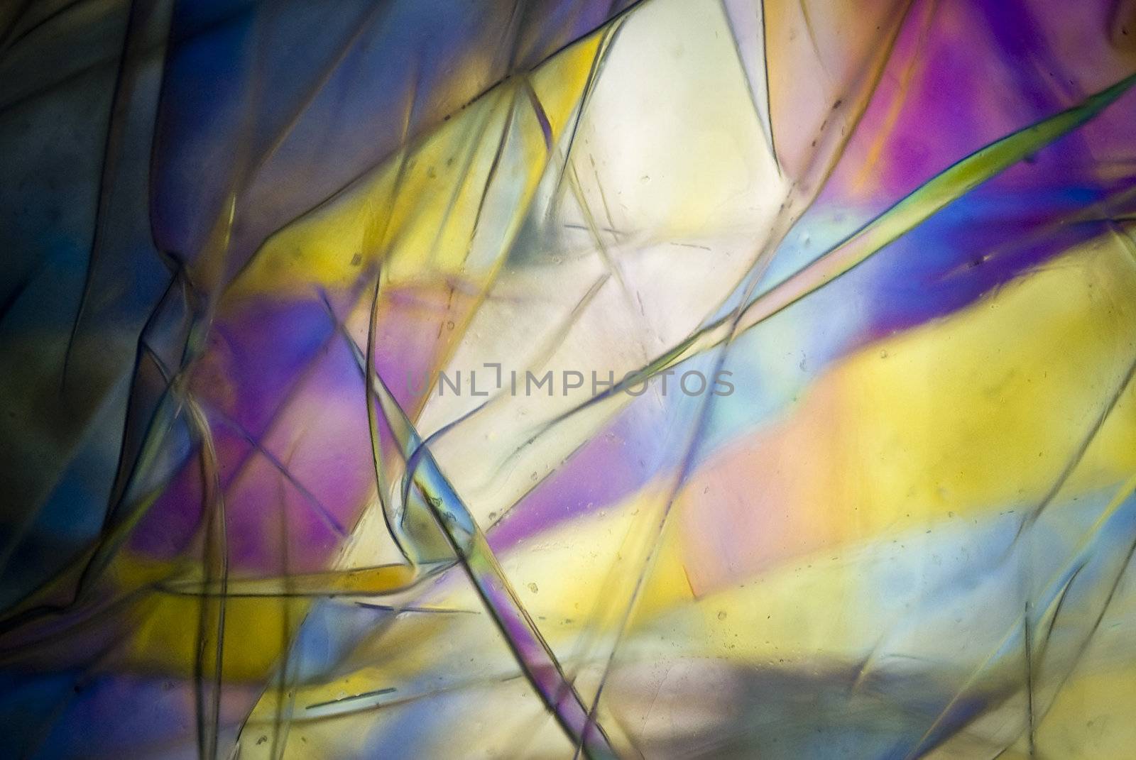 light graphics: microphoto of wrapped plastic foil in polarized light