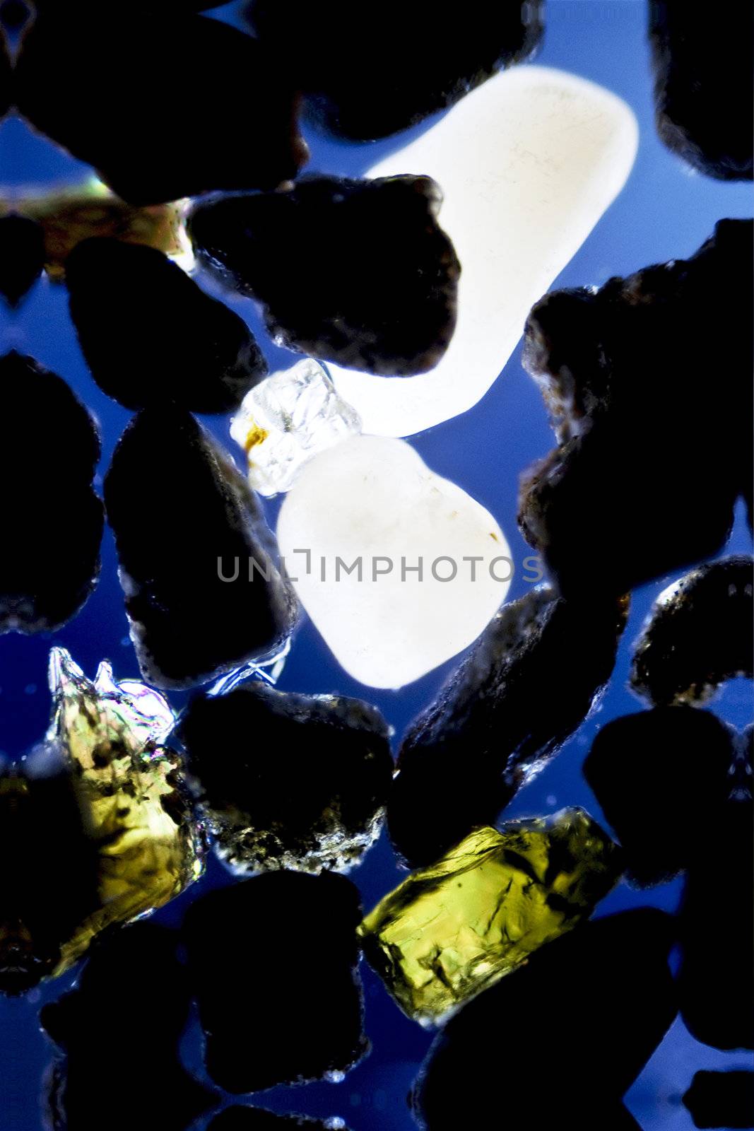 micro photo: grain of sand in polarized light