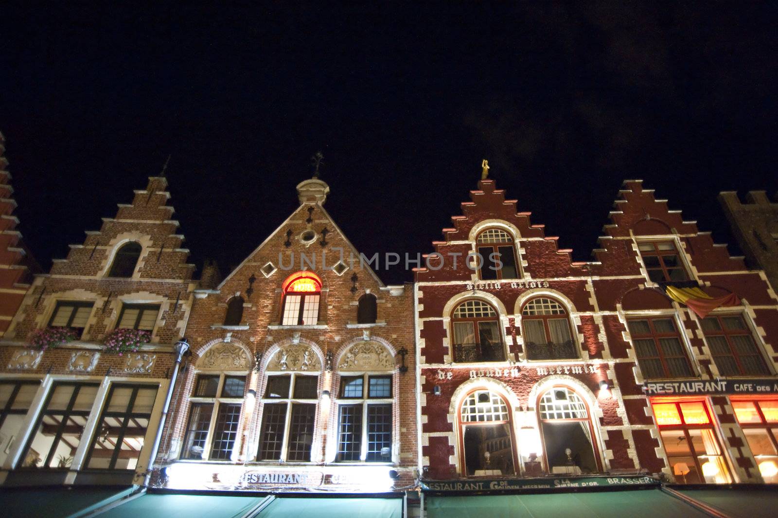 old town of bruges, belgium, by night