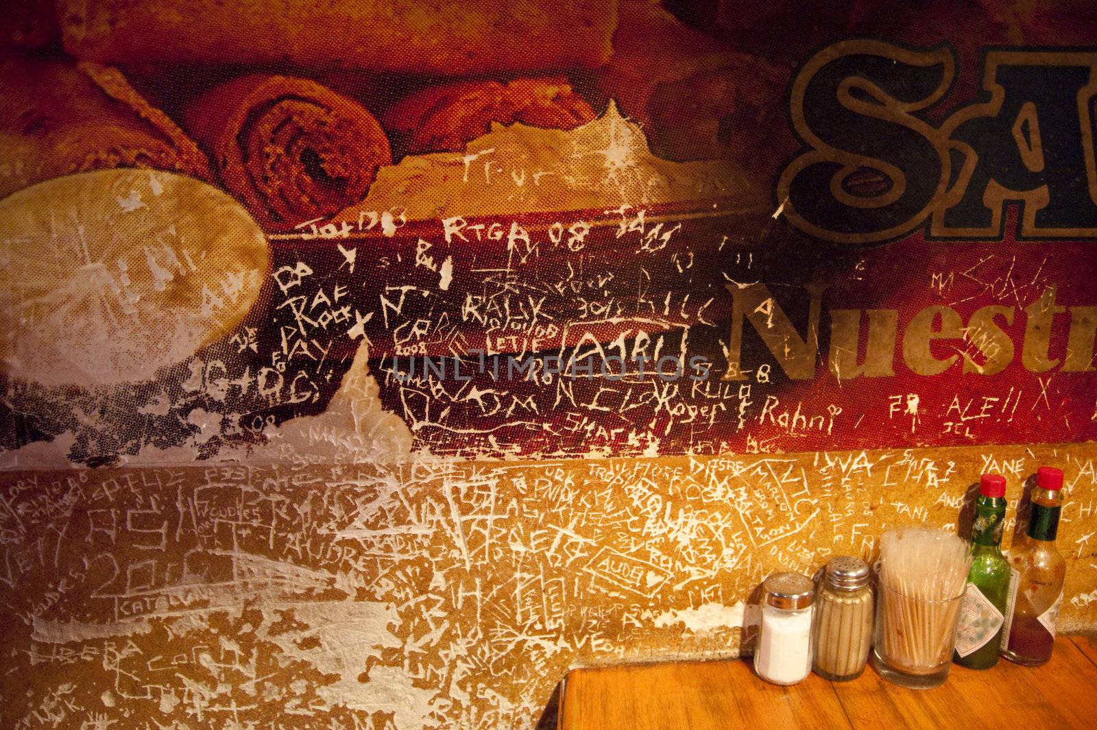 grafitti in an old steak house