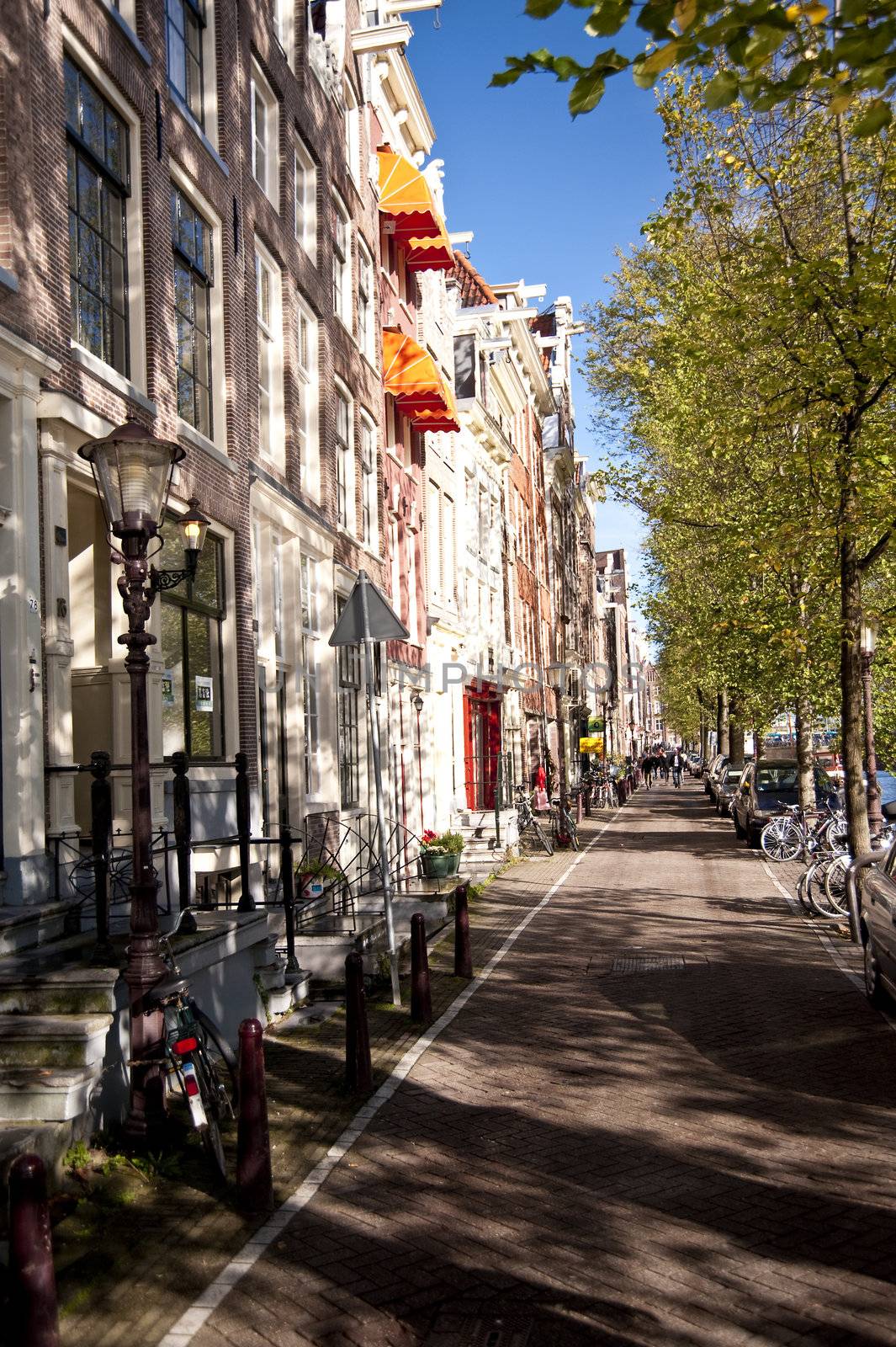 scene in the old town of amsterdam, netherlands