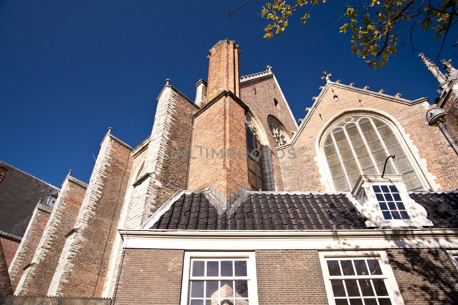 scene in the old town of amsterdam, netherlands
