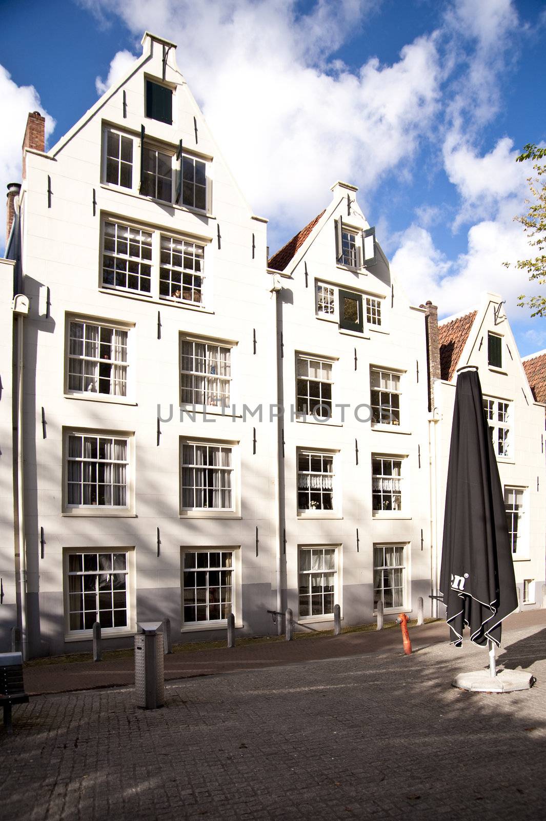 beguinage in the old town of amsterdam, netherlands (hdr)