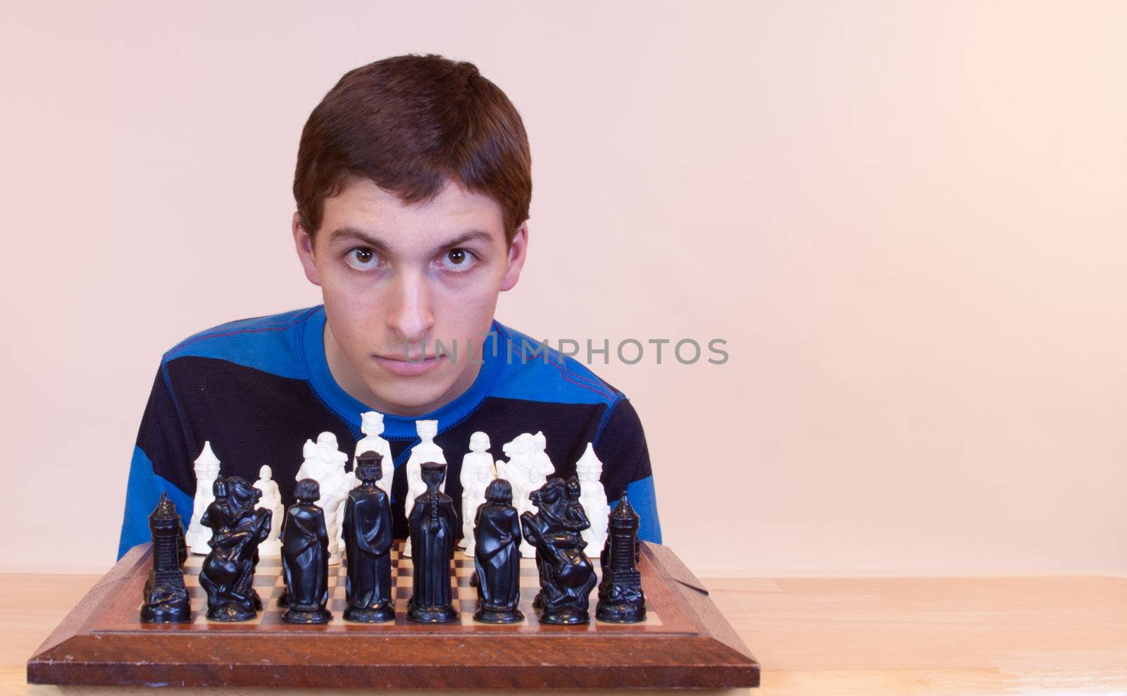 Young man playing chess