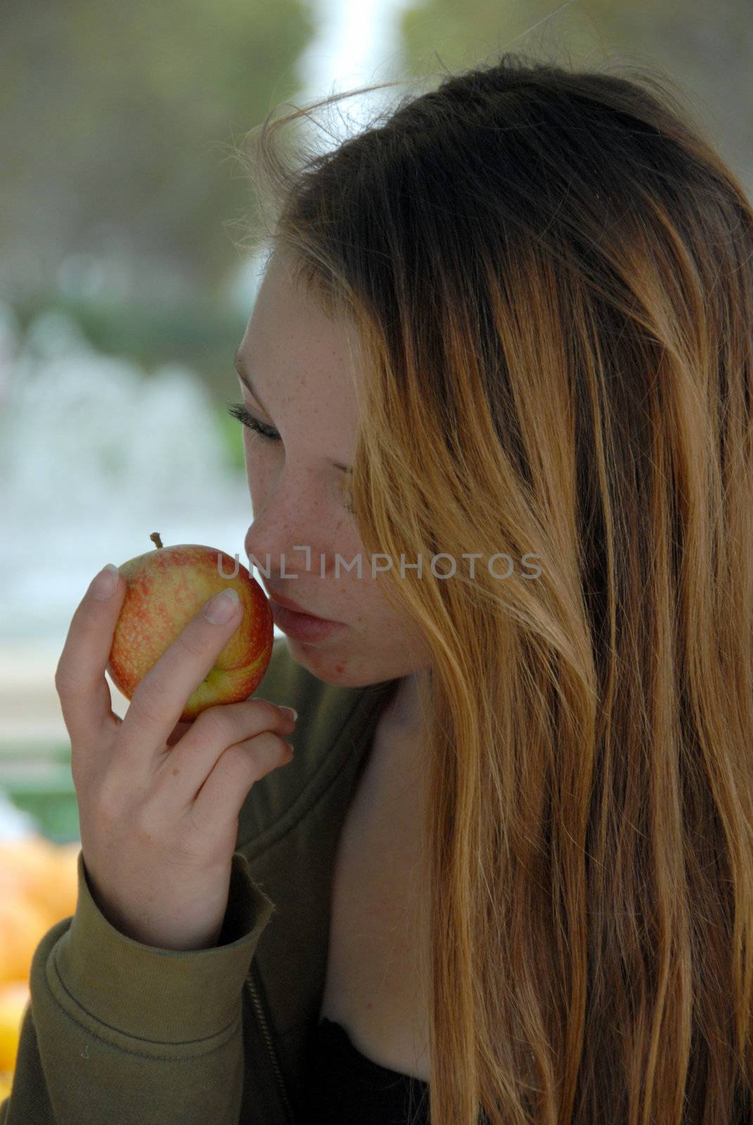 young girl and red apple by cynoclub