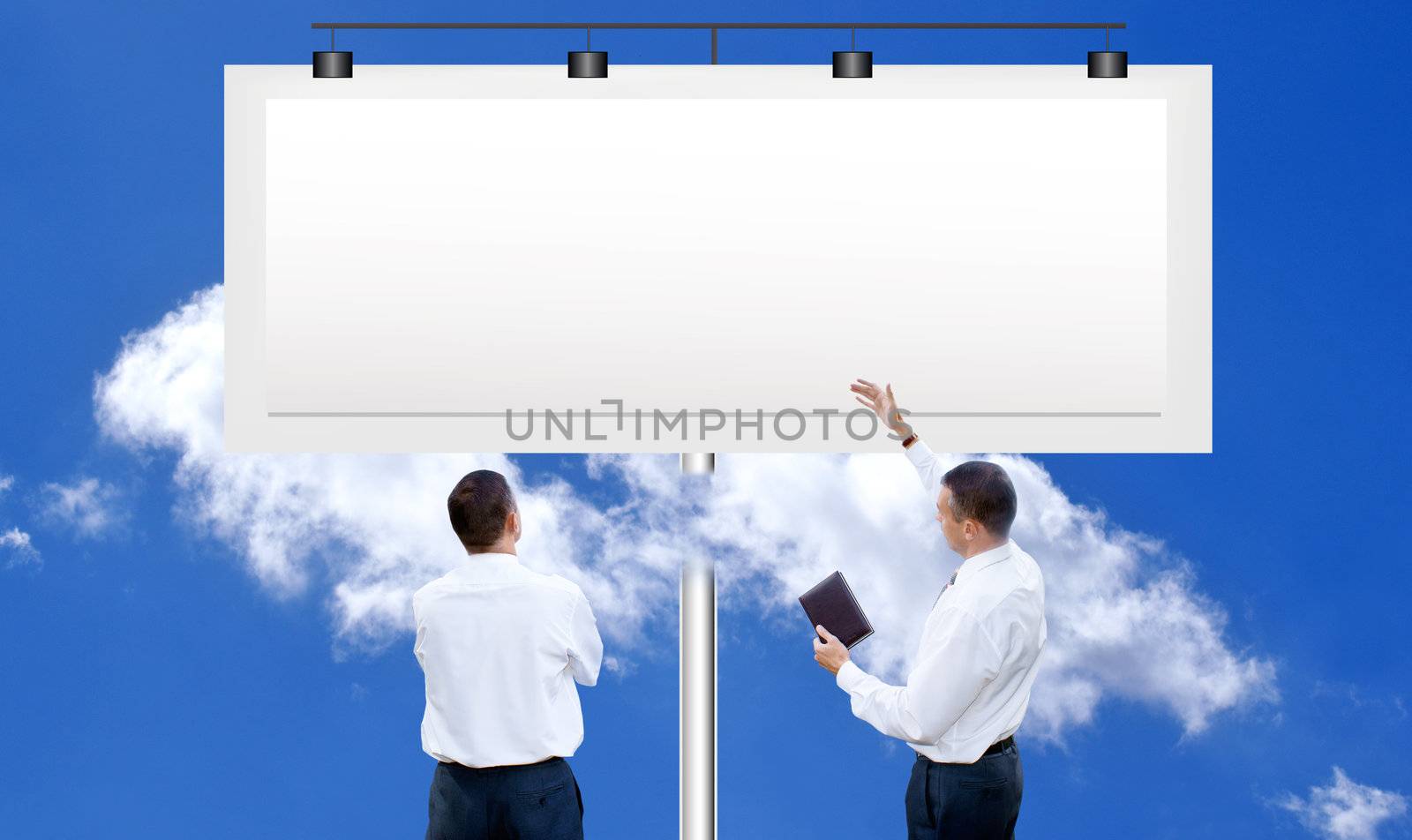 The people against a publicity board and the bright blue cloudy sky