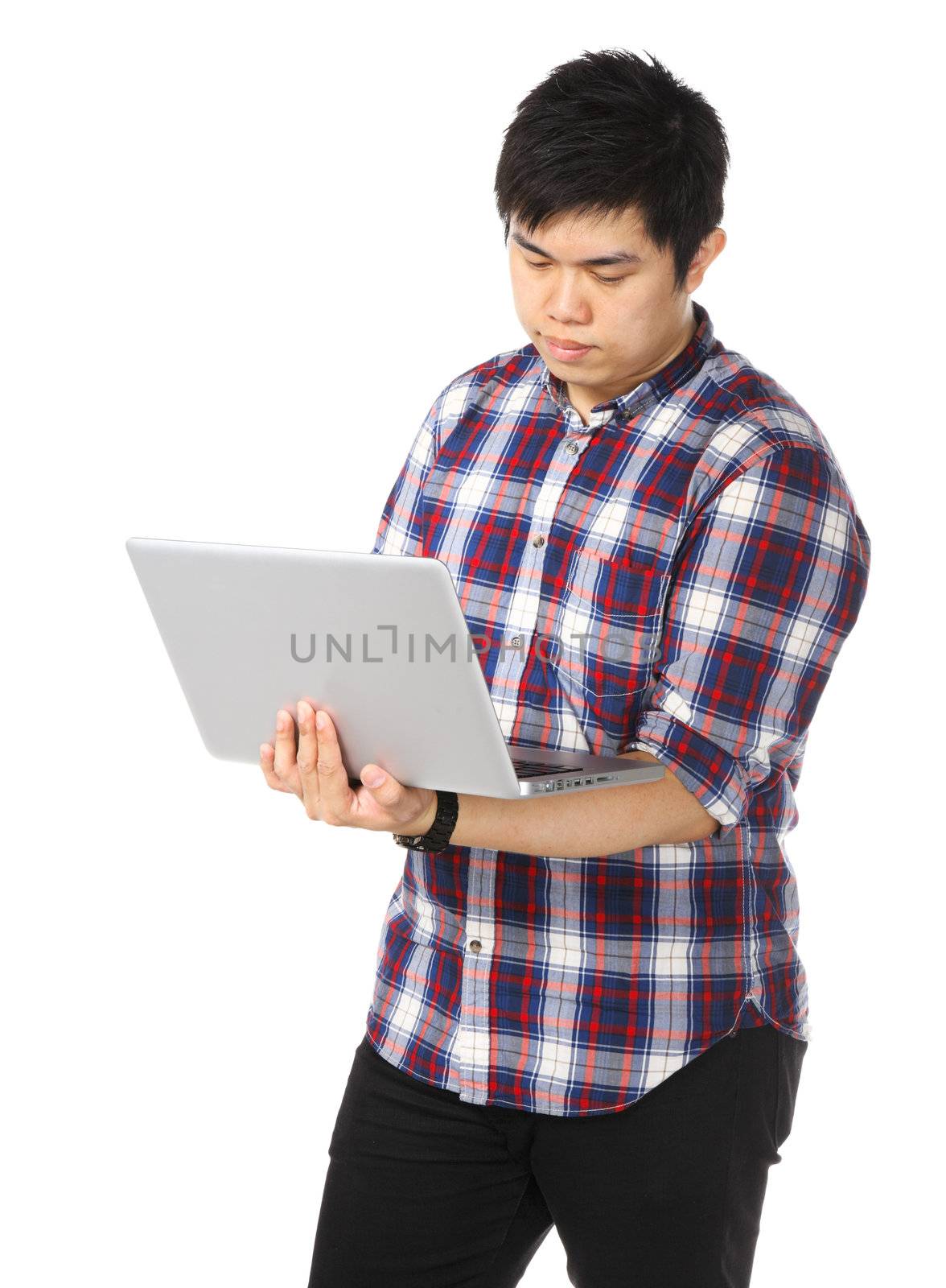 Young asian man using computer