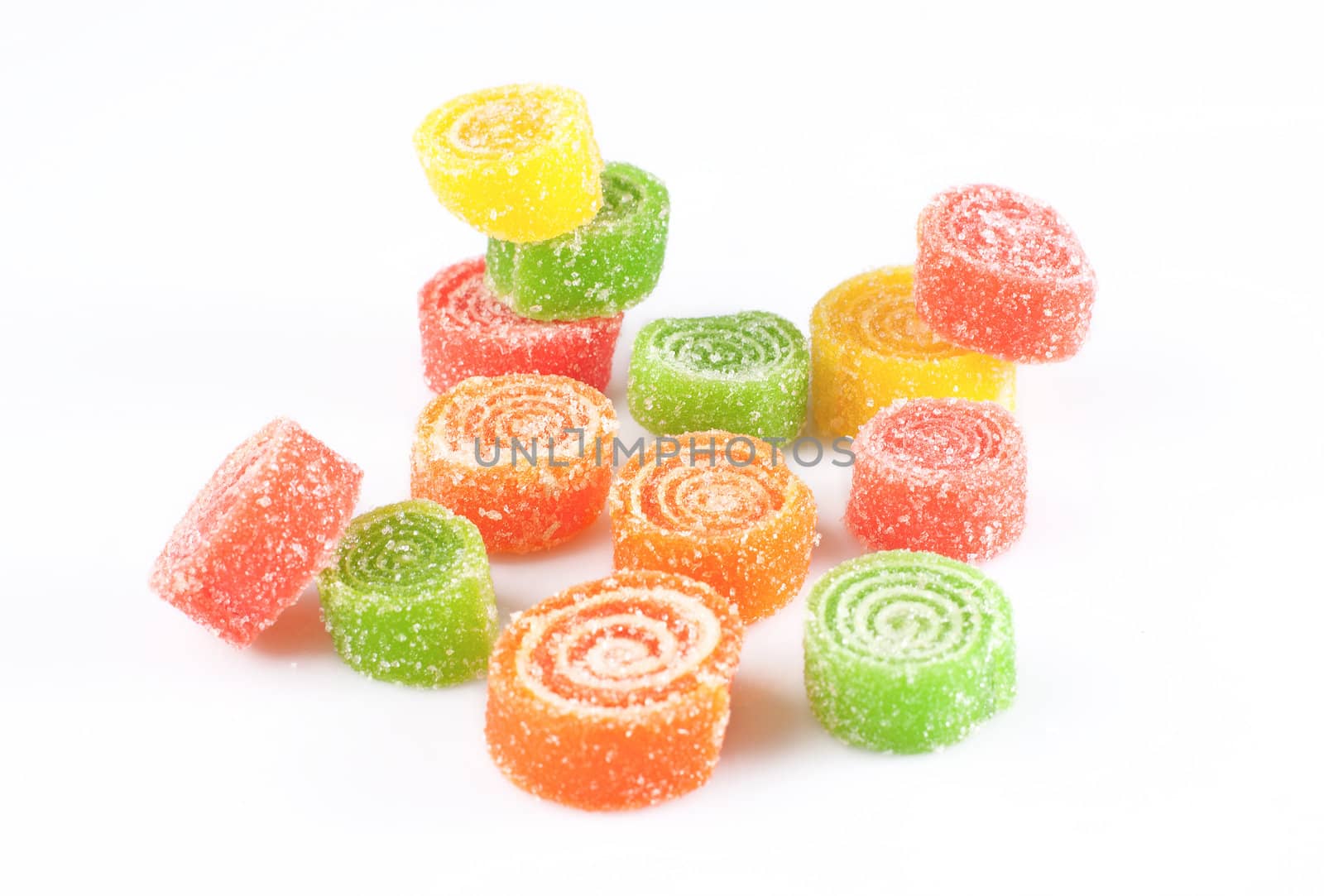 Candied fruit jelly on isolated white background