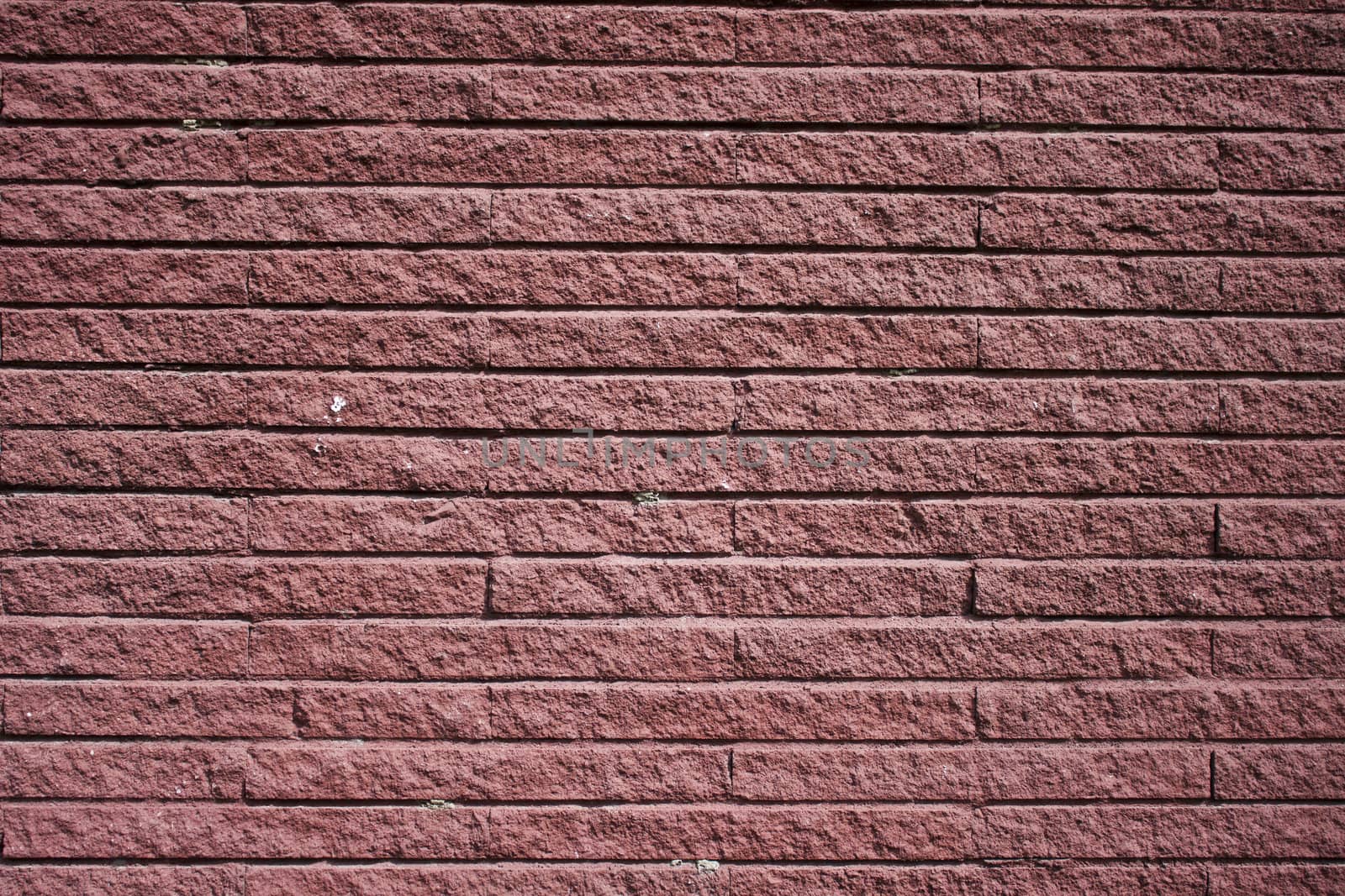 Ancient wall made from red brick.