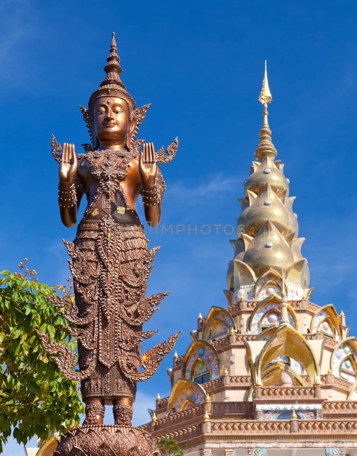 Golden pagoda and thai angel in Petchchaboon, Thailand