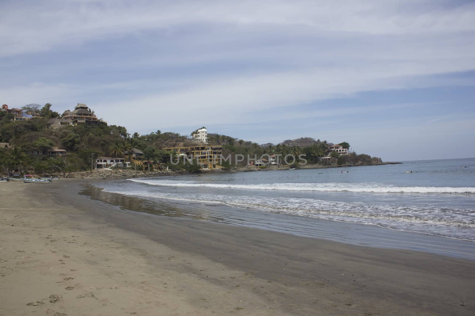 A beach in Mexico with large homes by jeremywhat