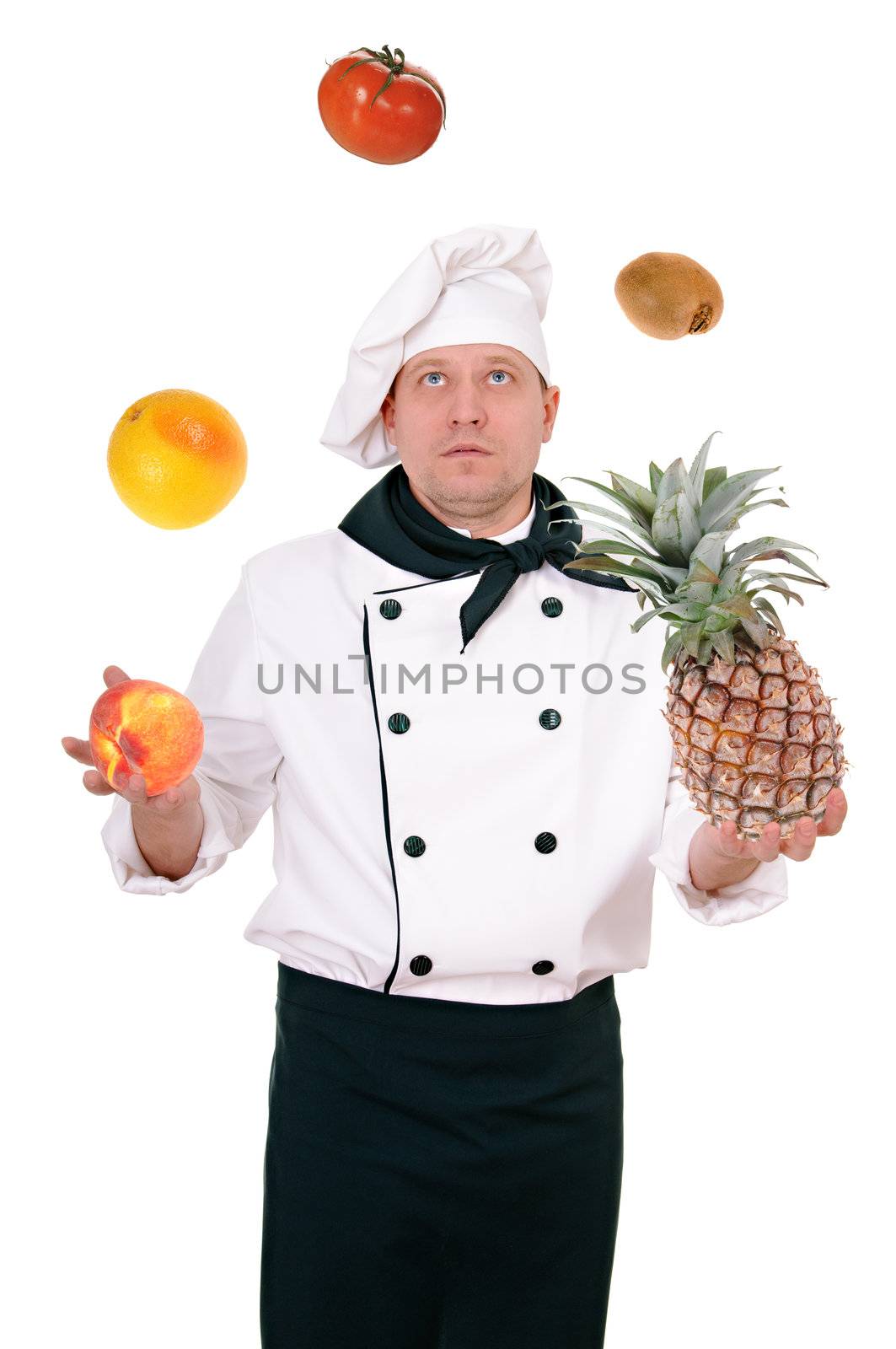 chef juggles fruit isolated on the white background