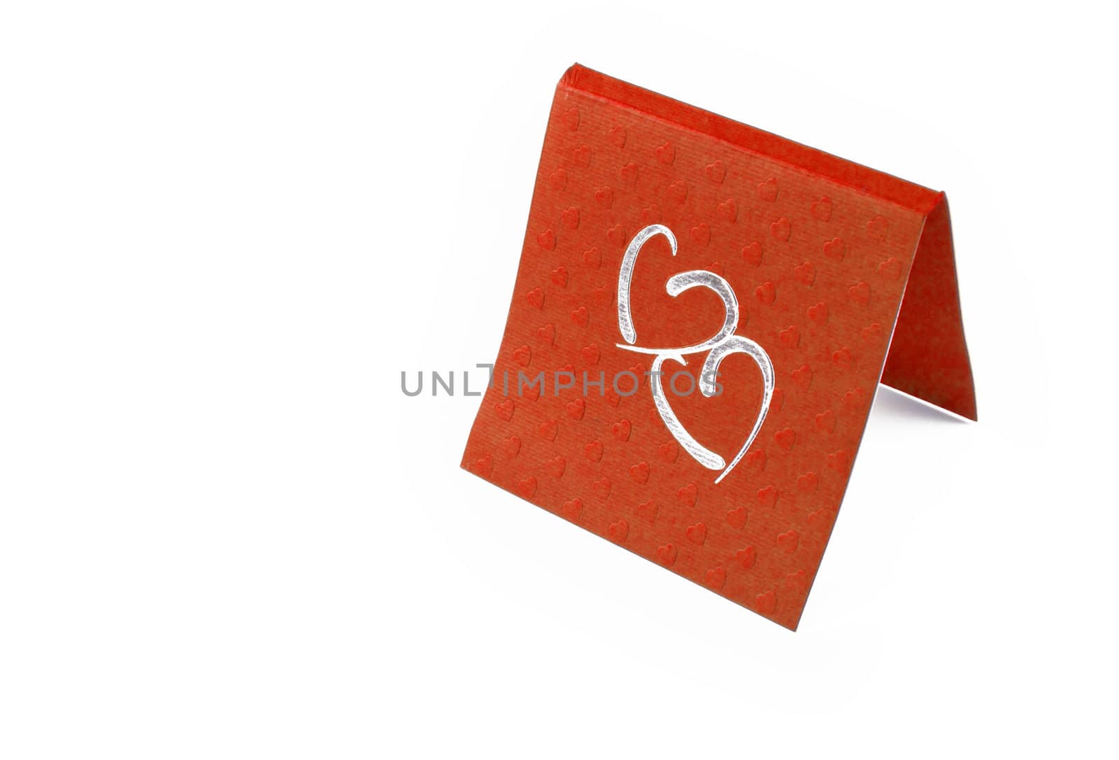 close up of card heart on white background