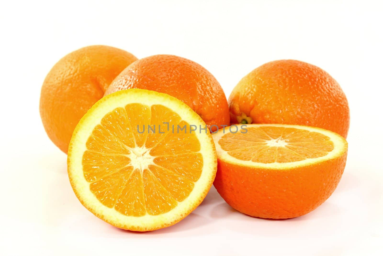 fresh sliced ??oranges on a white background