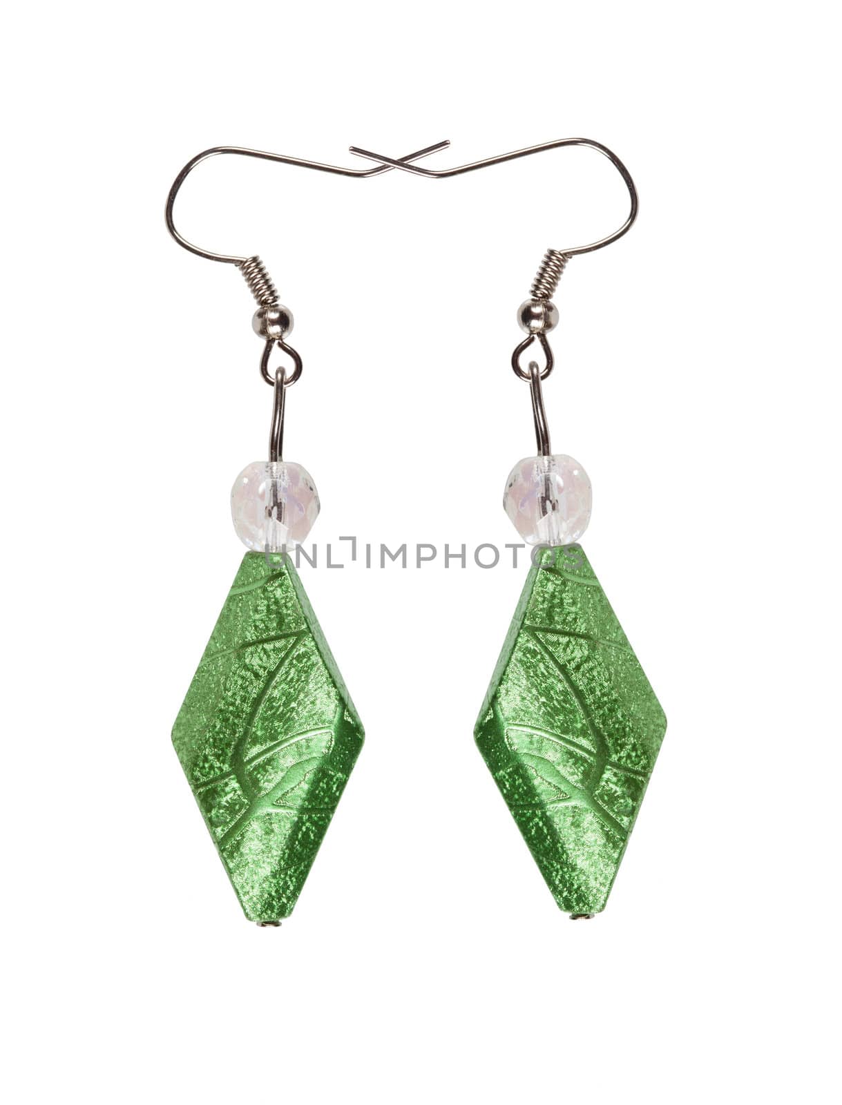 Earrings in silver diamond-shaped light green on a white background. Collage.