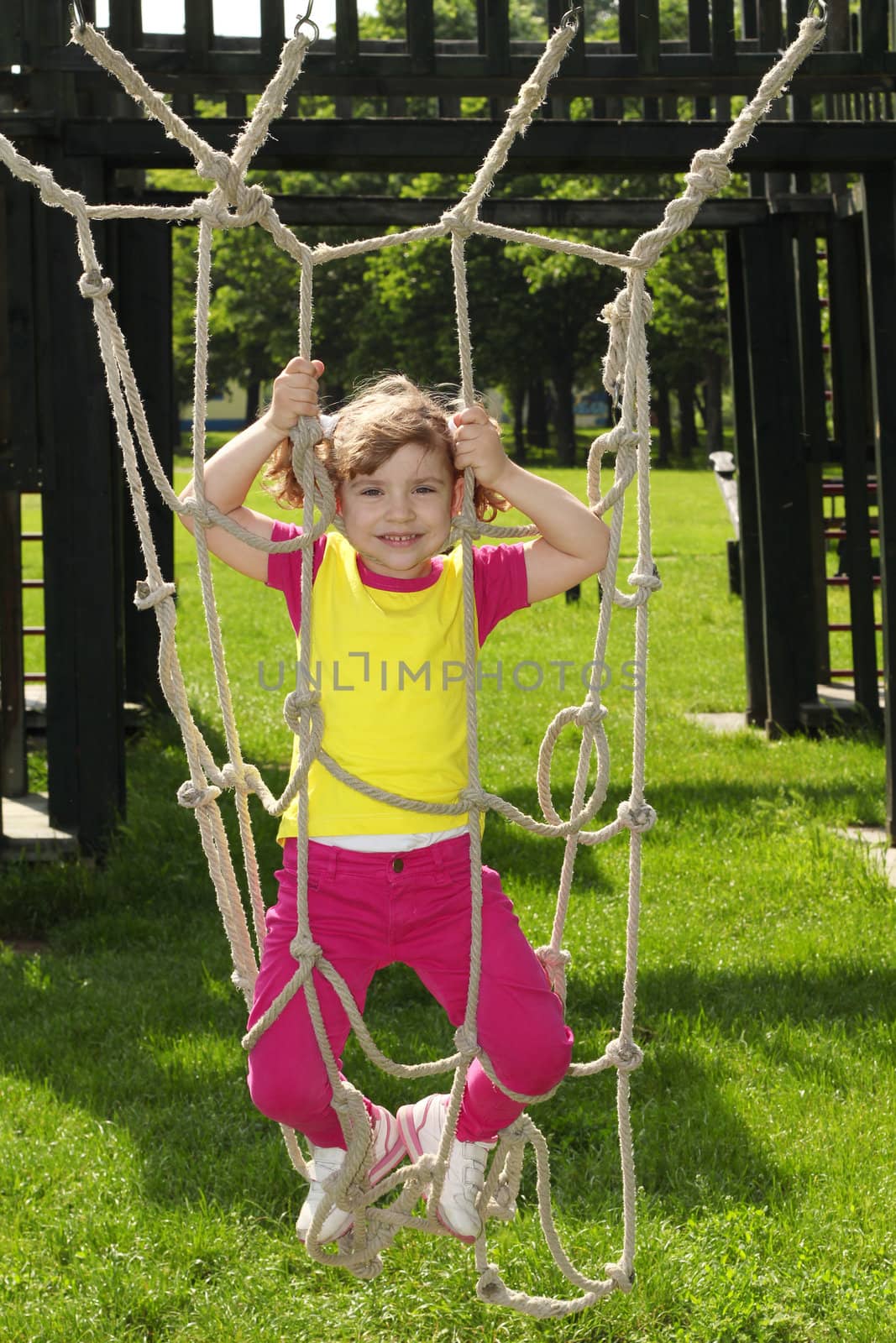 happy little girl on playground