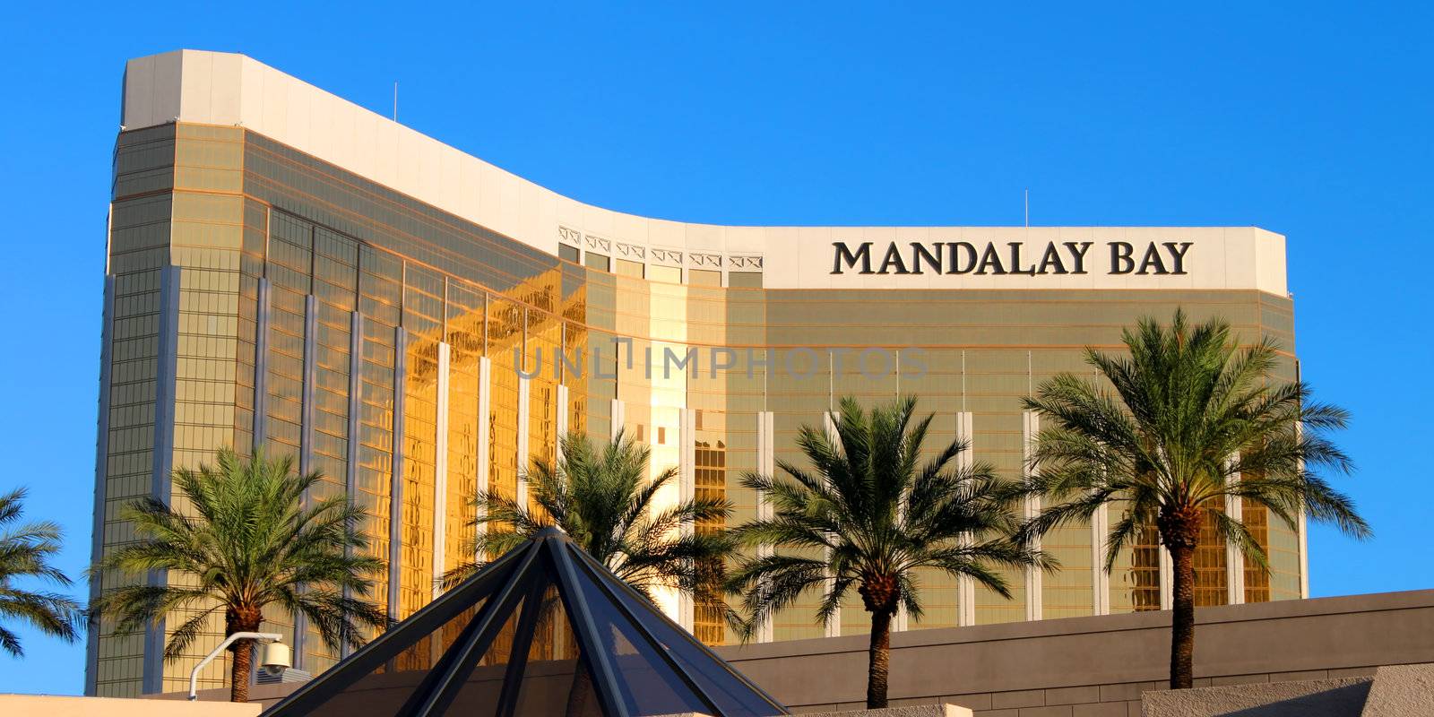 Las Vegas, USA - August 19, 2009: The Mandalay Bay Resort and Casino opened in 1999 in Las Vegas, Nevada.  Seen here is the reflective gold colored exterior of the 44-story tall main building.
