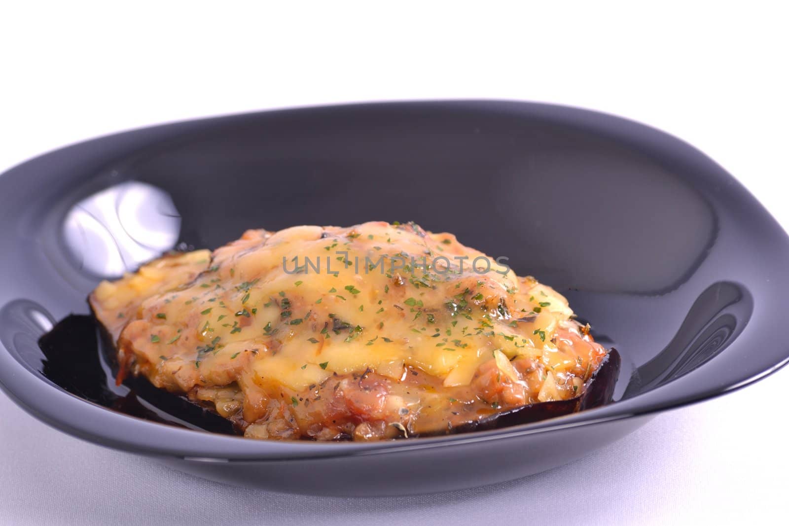 eggplant stuffed with peppers, minced meat and cheese