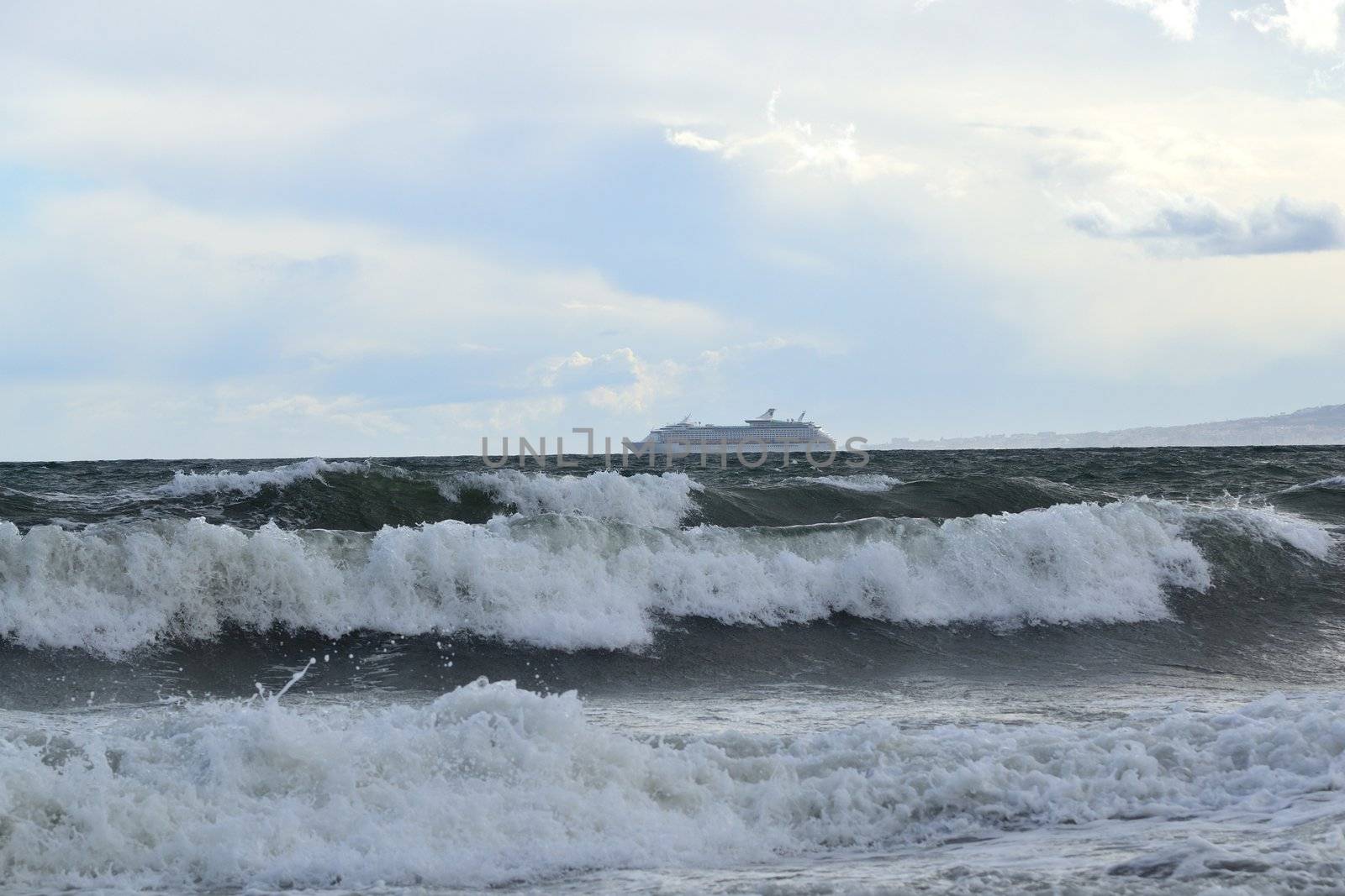 Outbound ship at sea during a storm in Malaga