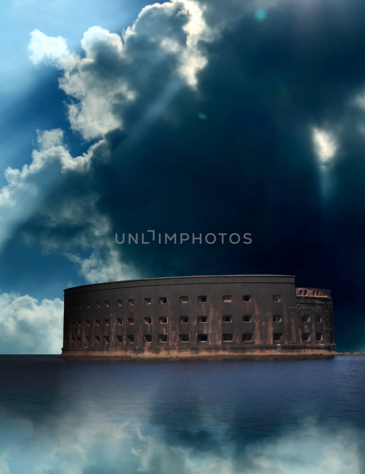 Ancient stone fortress on small island in the sea under storm clouds 